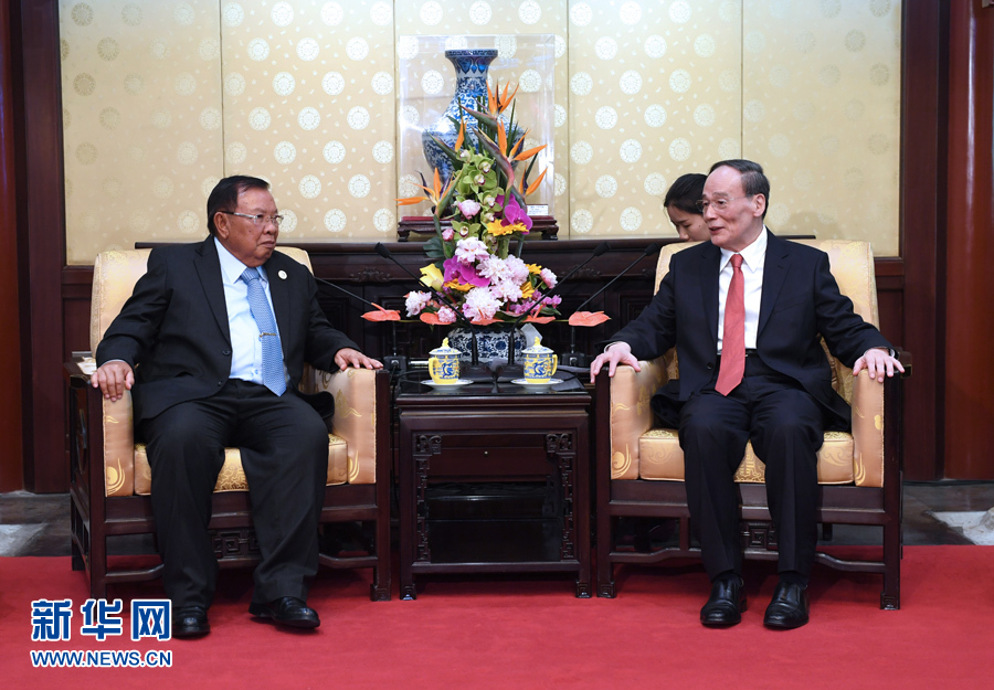 5月13日，中共中央政治局常委、中央紀委書記王岐山在北京釣魚臺國賓館會見老撾人民革命黨中央總書記、國家主席本揚。 新華社記者 饒愛民攝