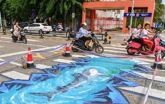 &ldquo;海洋世界&rdquo;3D立體斑馬線亮相?？? />  
<div>“海洋世界”3D立體斑馬線亮相海口</div>
</a> 
</div>
<div   id=