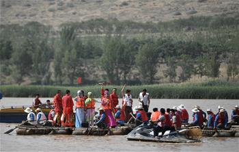 寧夏沙坡頭：羊皮筏上對&ldquo;花兒&rdquo;
