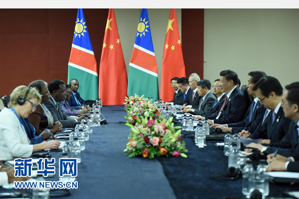 12月4日，國(guó)家主席習(xí)近平在約翰內(nèi)斯堡會(huì)見納米比亞總統(tǒng)根哥布。 新華社記者 張鐸 攝