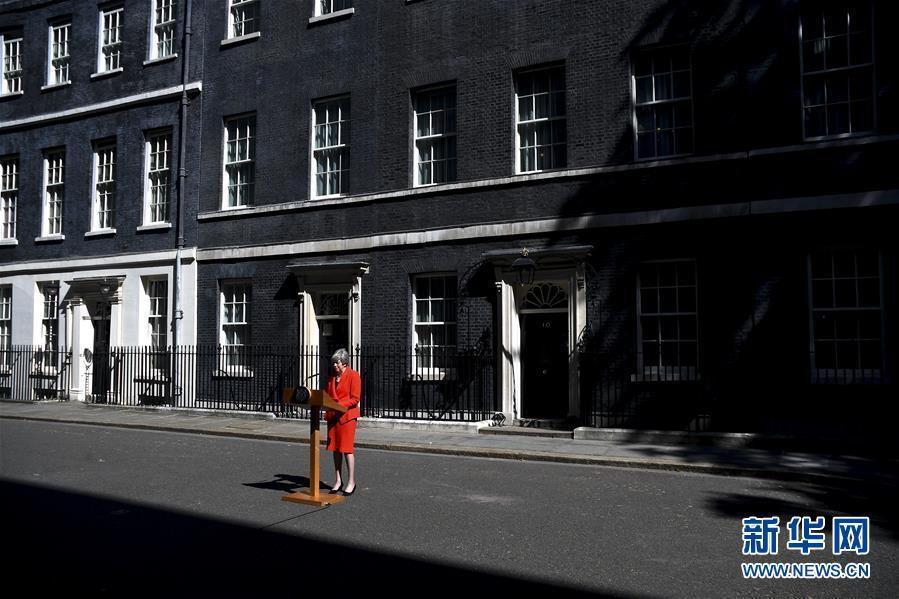 (國際)(1)英國首相將于下月辭去保守黨領(lǐng)導(dǎo)人職務(wù)