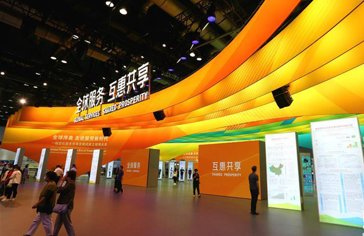 人民日報評論員：促進全球服務貿易發(fā)展繁榮 推動世界經(jīng)濟盡快復蘇